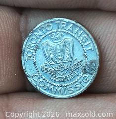 MaxSold Auction: Toronto Transit Commission (TTC) 1950s Aluminum Transit Token - South Frontenac (Ontario, Canada) SELLER MANAGED Downsizing Online Auction - Battersea Road