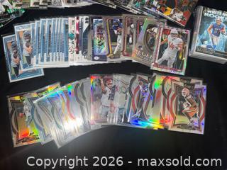 MaxSold Auction: 2024-2025 Football Trading Card Lot, 700+ Assorted Cards 40 Top Loaded 150-200 sleeved  - Buena Park (California, USA) SELLER MANAGED Moving Online Auction - Melrose Street