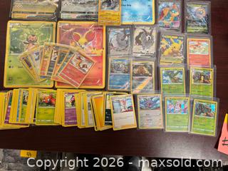 MaxSold Auction: Lot of 50+ Pokémon Trading Cards — Mixed Modern Sets - Buena Park (California, USA) SELLER MANAGED Moving Online Auction - Melrose Street