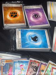 MaxSold Auction: Pokémon Trading Card Lot — 100+ Mixed Cards from 3 ETB Boxes of  Surging Sparks  - Buena Park (California, USA) SELLER MANAGED Moving Online Auction - Melrose Street