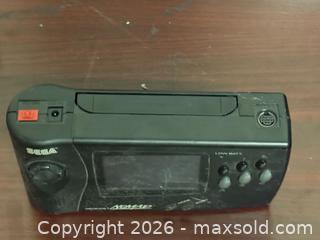 MaxSold Auction: Sega Genesis Nomad Portable Handheld Console, Black - Buena Park (California, USA) SELLER MANAGED Moving Online Auction - Melrose Street