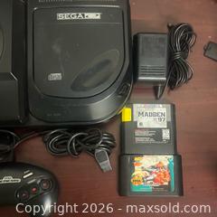 MaxSold Auction: Sega Genesis with Sega CD 2 Games 2 controllers  - Buena Park (California, USA) SELLER MANAGED Moving Online Auction - Melrose Street
