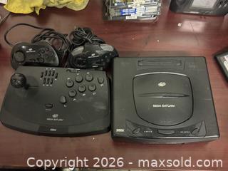 MaxSold Auction: Sega Saturn Home Console with Standard Controller & Arcade Joystick - Buena Park (California, USA) SELLER MANAGED Moving Online Auction - Melrose Street