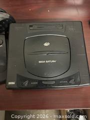 MaxSold Auction: Sega Saturn Home Console with Standard Controller & Arcade Joystick - Buena Park (California, USA) SELLER MANAGED Moving Online Auction - Melrose Street
