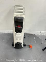 MaxSold Auction: DeLonghi Portable Radiator Space Heater on Casters - Los Angeles (California, USA) SUPER SHORT NOTICE SELLER MANAGED Charity/Fundraising Online Auction - Vanowen Street
