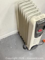 MaxSold Auction: DeLonghi Portable Radiator Space Heater on Casters - Los Angeles (California, USA) SUPER SHORT NOTICE SELLER MANAGED Charity/Fundraising Online Auction - Vanowen Street