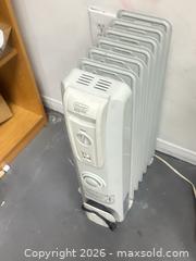 MaxSold Auction: DeLonghi SafeHeat ComfortTemp Oil-Filled Radiator Heater - Los Angeles (California, USA) SUPER SHORT NOTICE SELLER MANAGED Charity/Fundraising Online Auction - Vanowen Street