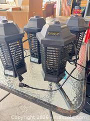 MaxSold Auction: 4 Outdoor Bug Zappers  - Cocoa (Florida, USA) SELLER MANAGED Estate Sale Online Auction - Broadcast Court