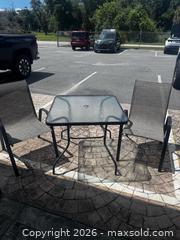 MaxSold Auction: Patio table with two chairs - Cocoa (Florida, USA) SELLER MANAGED Estate Sale Online Auction - Broadcast Court