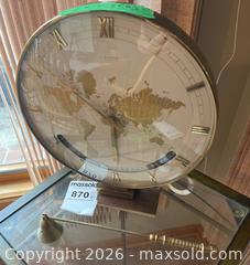 MaxSold Auction: Kienzle Automatic World Time Clock and aBrass Candle Snuffer - Kingston (Ontario, Canada) PARTNER MANAGED Downsizing Online Auction - Nottingham Place