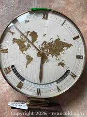 MaxSold Auction: Kienzle Automatic World Time Clock and aBrass Candle Snuffer - Kingston (Ontario, Canada) PARTNER MANAGED Downsizing Online Auction - Nottingham Place