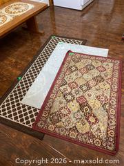 MaxSold Auction: Three Area Rugs with Various Patterns and Sizes - Kingston (Ontario, Canada) PARTNER MANAGED Downsizing Online Auction - Nottingham Place