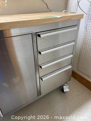 MaxSold Auction: Trinity 72-Inch Rolling Workbench with Stainless Steel and Butcher Block Top - Kingston (Ontario, Canada) PARTNER MANAGED Downsizing Online Auction - Nottingham Place
