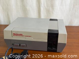 MaxSold Auction: Nintendo NES Console Bundle w/ Zapper Light Gun, Controller, Cables & Beyond Nintendo Masters Guide - Hamilton (Ontario, Canada) SELLER MANAGED Estate Sale Online Auction - Gertrude Street