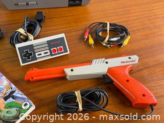 MaxSold Auction: Nintendo NES Console Bundle w/ Zapper Light Gun, Controller, Cables & Beyond Nintendo Masters Guide - Hamilton (Ontario, Canada) SELLER MANAGED Estate Sale Online Auction - Gertrude Street