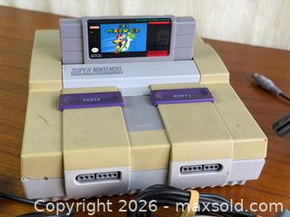 MaxSold Auction: Nintendo Super Nintendo SNES Console Bundle w/ Super Mario World 2 Controllers Untested - Hamilton (Ontario, Canada) SELLER MANAGED Estate Sale Online Auction - Gertrude Street