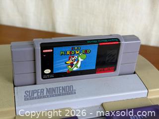 MaxSold Auction: Nintendo Super Nintendo SNES Console Bundle w/ Super Mario World 2 Controllers Untested - Hamilton (Ontario, Canada) SELLER MANAGED Estate Sale Online Auction - Gertrude Street