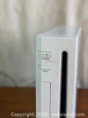 MaxSold Auction: Nintendo Wii Console Bundle – 3 Remotes, Nunchuks, Classic Controller & Wii Sports Resort - Hamilton (Ontario, Canada) SELLER MANAGED Estate Sale Online Auction - Gertrude Street