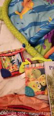 MaxSold Auction: Baby Play Gym with Cloth Books, Peter Rabbit Hardcover, Teethers - Toronto (Ontario, Canada) SELLER MANAGED Downsizing Online Auction - Fisherville Road