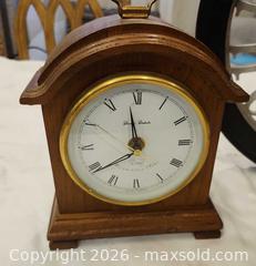 MaxSold Auction: Traditional Wood Mantel/Table Clock with Brass-Colored Trim with every hour melody. - Toronto (Ontario, Canada) SELLER MANAGED Downsizing Online Auction - Fisherville Road