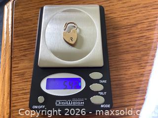 MaxSold Auction: 10K Yellow Gold Padlock Pendant - Toronto (Ontario, Canada) PARTNER MANAGED Downsizing Online Auction - Norris Place