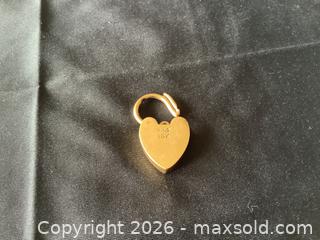 MaxSold Auction: 10K Yellow Gold Padlock Pendant - Toronto (Ontario, Canada) PARTNER MANAGED Downsizing Online Auction - Norris Place