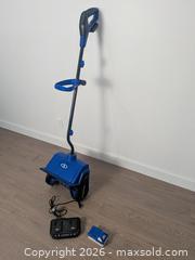 MaxSold Auction: Snow Joe Electric Shovel with Battery and Battery Charger - Cobourg (Ontario, Canada) SELLER MANAGED Downsizing Online Auction - Division