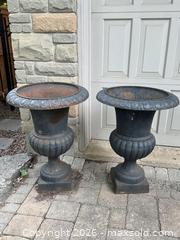 MaxSold Auction: Pair of Cast Iron Garden Urns / Planters, ~24 in H - Toronto (Ontario, Canada) SELLER MANAGED Moving Online Auction - Herne Hill
