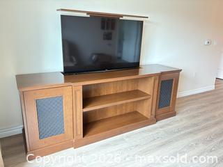 MaxSold Auction: Custom made Solid Wood Brown TV Stand with TV Lift and Cabinets.  Includes 55 inch Samsung TV (working)   - Kawartha Lakes (Ontario, Canada) SELLER MANAGED Downsizing Online Auction - Albert Street South (CONDO)