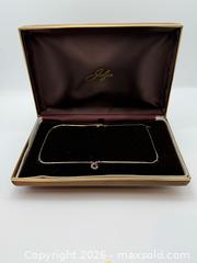 MaxSold Auction: 14K Gold Diamond Pendant Necklace - South Dundas (Ontario, Canada) SELLER MANAGED Estate Sale Online Auction - Main Street