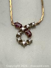 MaxSold Auction: 14K Gold Diamond Pendant Necklace - South Dundas (Ontario, Canada) SELLER MANAGED Estate Sale Online Auction - Main Street