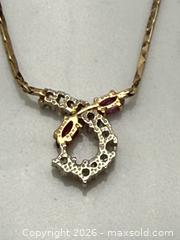 MaxSold Auction: 14K Gold Diamond Pendant Necklace - South Dundas (Ontario, Canada) SELLER MANAGED Estate Sale Online Auction - Main Street