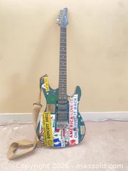 MaxSold Auction: Green 6-String Electric Guitar H-S-S with Strap - Vancouver (British Columbia, Canada) SELLER MANAGED Moving Online Auction - 6th Avenue East (CONDO)