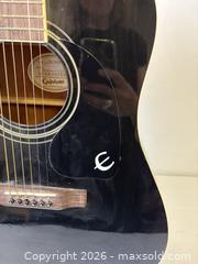 MaxSold Auction: Ebony Finish Epiphone DR 6 String Acoustic Guitar - Toronto (Ontario, Canada) PARTNER MANAGED Reseller Online Auction - Railside Road