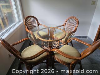 MaxSold Auction: Round Rattan Wicker Dining Table with Glass Top & 4 Chairs - Ottawa (Ontario, Canada) SELLER MANAGED Moving Online Auction - Deerwood Drive