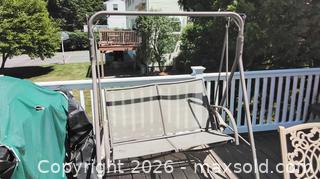 MaxSold Auction: Cast Aluminum Patio Set with Swivel Chairs, Umbrella & Swing - Framingham (Massachusetts, USA) PARTNER MANAGED Downsizing Online Auction - Lanewood Avenue