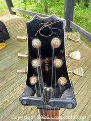 MaxSold Auction: Peavey semi-acoustic guitar.Semi-hollow Sunburst Electric Guitar, HH Pickup, Gold Hardware - Leeds And The Thousand Islands (Ontario, Canada) SELLER MANAGED Downsizing Online Auction - 1000 Islands Parkway
