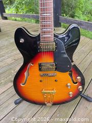 MaxSold Auction: Peavey semi-acoustic guitar.Semi-hollow Sunburst Electric Guitar, HH Pickup, Gold Hardware - Leeds And The Thousand Islands (Ontario, Canada) SELLER MANAGED Downsizing Online Auction - 1000 Islands Parkway