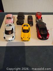 MaxSold Auction: Lot of 7 Mixed Diecast Model Cars 1:32–1:43 - Arvada (Colorado, USA) SELLER MANAGED Moving Online Auction - W 54th Lane