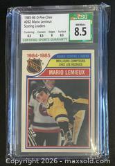 MaxSold Auction: Mario Lemieux 1985-86 OPC Rookie Scoring Leaders Card #262 Graded 8.5 - Ajax (Ontario, Canada) SELLER MANAGED Reseller Online Auction - Harwood Ave. N (STORAGE)