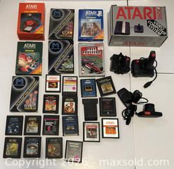 MaxSold Auction: Vintage Atari console, controllers and games - Welland (Ontario, Canada) SELLER MANAGED Downsizing Online Auction - McMaster Avenue