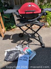 MaxSold Auction: Weber Q1200 Portable Propane Grill, Red/Black & manual/parts list - Brantford (Ontario, Canada) SELLER MANAGED Estate Sale Online Auction - Baldwin Avenue Part One 