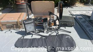 MaxSold Auction: Musician's Lot - Mackie 1402-VLZ Mixer, Microphones, Guitar Stands, Snake Cables, Cases and Assorted Music Related items - Oakland (California, USA) SELLER MANAGED Downsizing Online Auction - Carrington Street