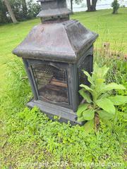 MaxSold Auction: Medium Metal Outdoor Wood Fire Pit, Black/Brown Rust Finish - Leeds And The Thousand Islands (Ontario, Canada) SELLER MANAGED Moving Online Auction - Chisamore Point Road