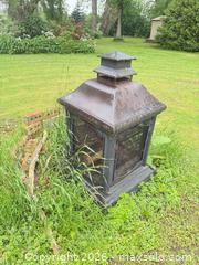 MaxSold Auction: Medium Metal Outdoor Wood Fire Pit, Black/Brown Rust Finish - Leeds And The Thousand Islands (Ontario, Canada) SELLER MANAGED Moving Online Auction - Chisamore Point Road