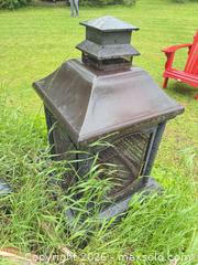MaxSold Auction: Medium Metal Outdoor Wood Fire Pit, Black/Brown Rust Finish - Leeds And The Thousand Islands (Ontario, Canada) SELLER MANAGED Moving Online Auction - Chisamore Point Road