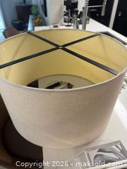 MaxSold Auction: Brace Ombre floor lamp from CB2 features a brass-finished tripod stand that transitions in black, 64.5" H - Miami (Florida, USA) PARTNER MANAGED Downsizing Online Auction - North West 5th Street (STORAGE)