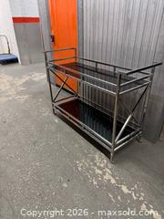 MaxSold Auction: Victor Buffet with 2 Black Glass Shelves, Chrome Frame - Miami (Florida, USA) PARTNER MANAGED Downsizing Online Auction - North West 5th Street (STORAGE)