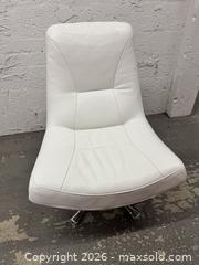 MaxSold Auction: White Leather Lounge Chair with Ottoman, Chrome Base - Miami (Florida, USA) PARTNER MANAGED Downsizing Online Auction - North West 5th Street (STORAGE)