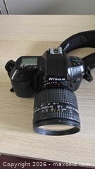 MaxSold Auction: Nikon F70 35mm SLR Camera + AF Nikkor 24-120mm f/3.5-5.6 Lens - Mississauga (Ontario, Canada) SELLER MANAGED Downsizing Online Auction - Wild Rose Street